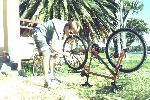 Erik dismounting a flat tire at Mandurah